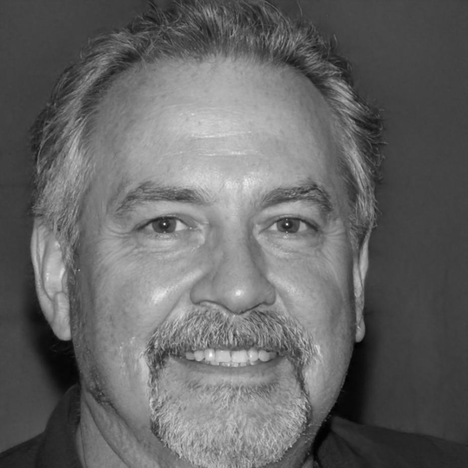 Portrait of Finnegan Wolfe, Curriculum Director at karioivial